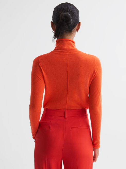 Orange roll on sale neck top