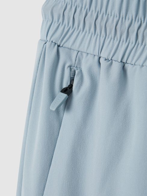 Castore Water Repellent Track Pants in Blue Silver