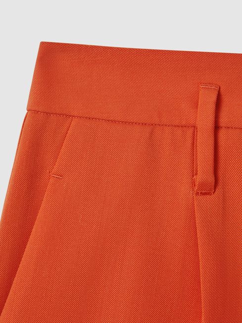 McLaren F1 Wool Blend Pleated Shorts in Papaya