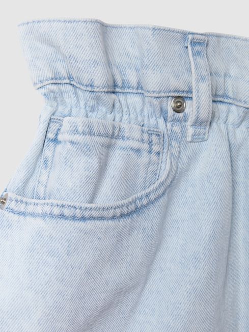 Good American Elasticated Waist Distressed Denim Shorts in Light Blue