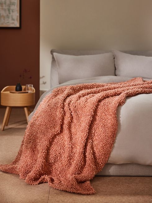Textured throw clearance