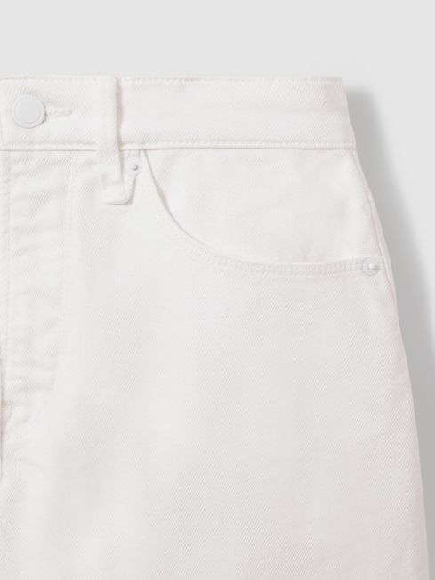 Good American Raw Hem Denim Shorts in White