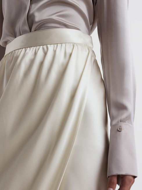 Jupe new arrivals drapée synonyme