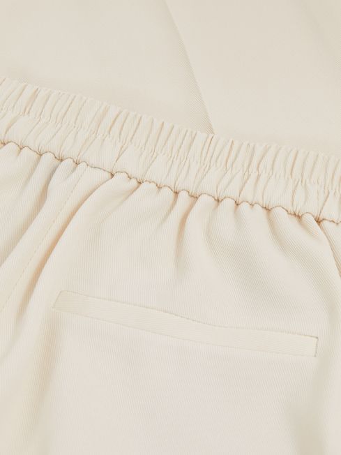 Tapered Elasticated-Waist Trousers in Cream