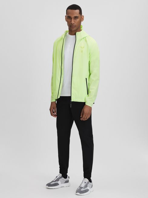 Castore Water Repellent Running Jacket in Iced Citrus Yellow REISS Ireland