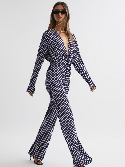 Navy and white polka dot jumpsuit discount
