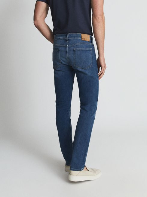 Paige High Stretch Slim Fit Jeans in Light Indigo