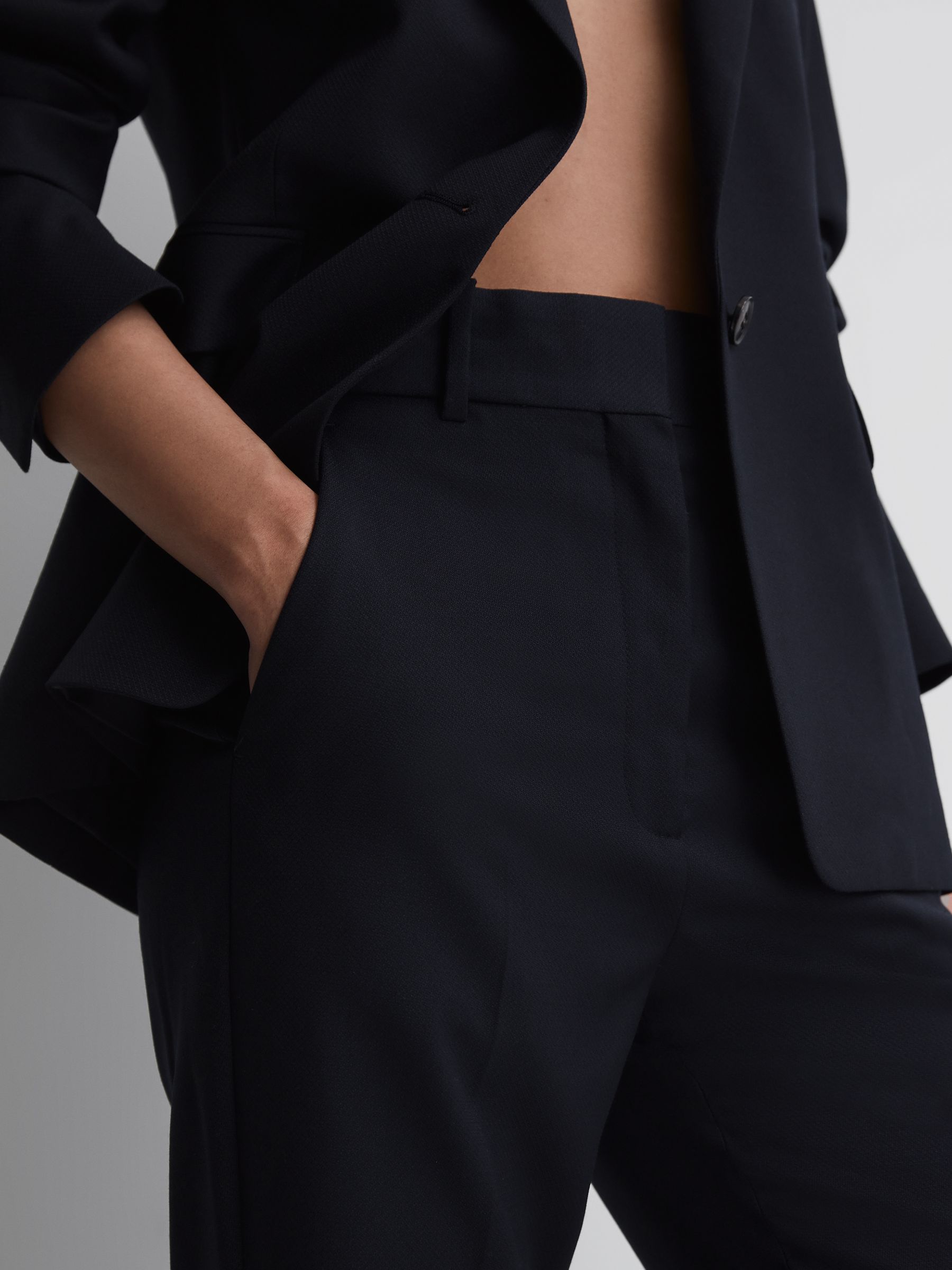 Petite Tailored Flared Suit Trousers in Navy - REISS