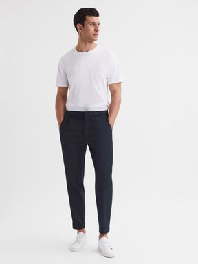 Relaxed Pleated Tapered Trousers in Navy