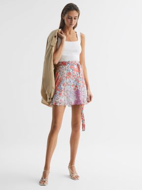 Floral Print High Rise Mini Skirt in Coral/White