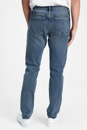 hengel expositie bureau Buy Gap Temperature Control Slim Taper Jeans from the Gap online shop