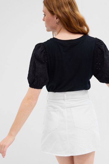 Black top with white puff sleeves outlet