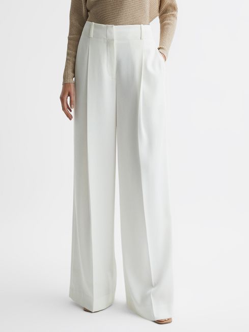 Mid Rise Wide Leg Trousers in White - REISS