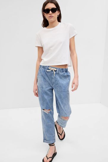 Buy Light Wash Blue High Waisted Ripped Pull On Mom Jeans from the Gap ...