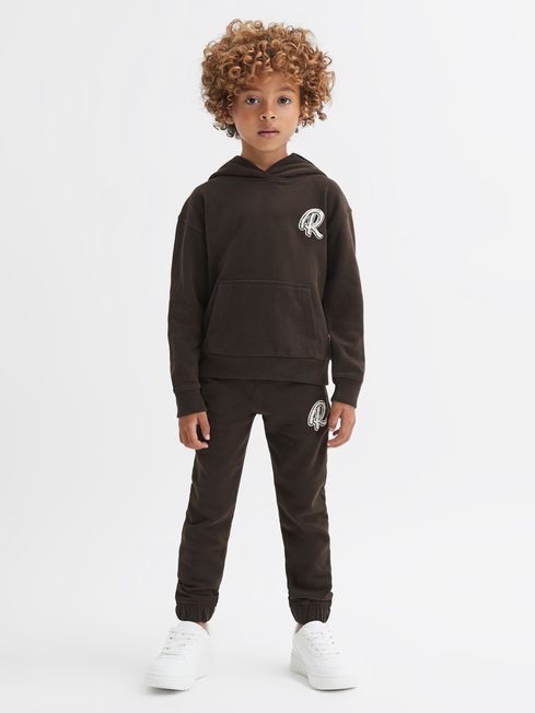 Junior Relaxed Garment Dyed Logo Hoodie in Chocolate - REISS
