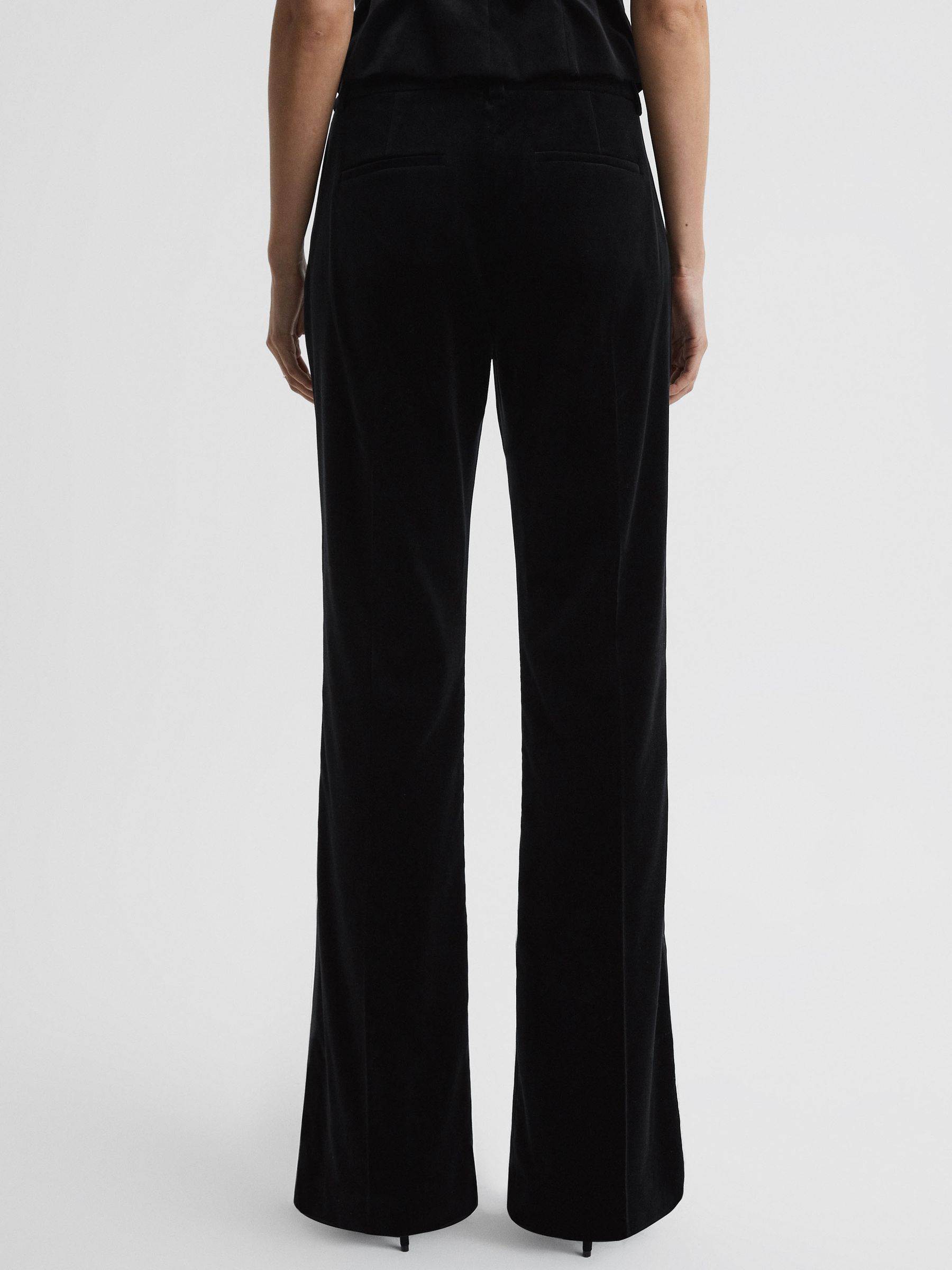 Petite Velvet Flared Suit Trousers in Black - REISS