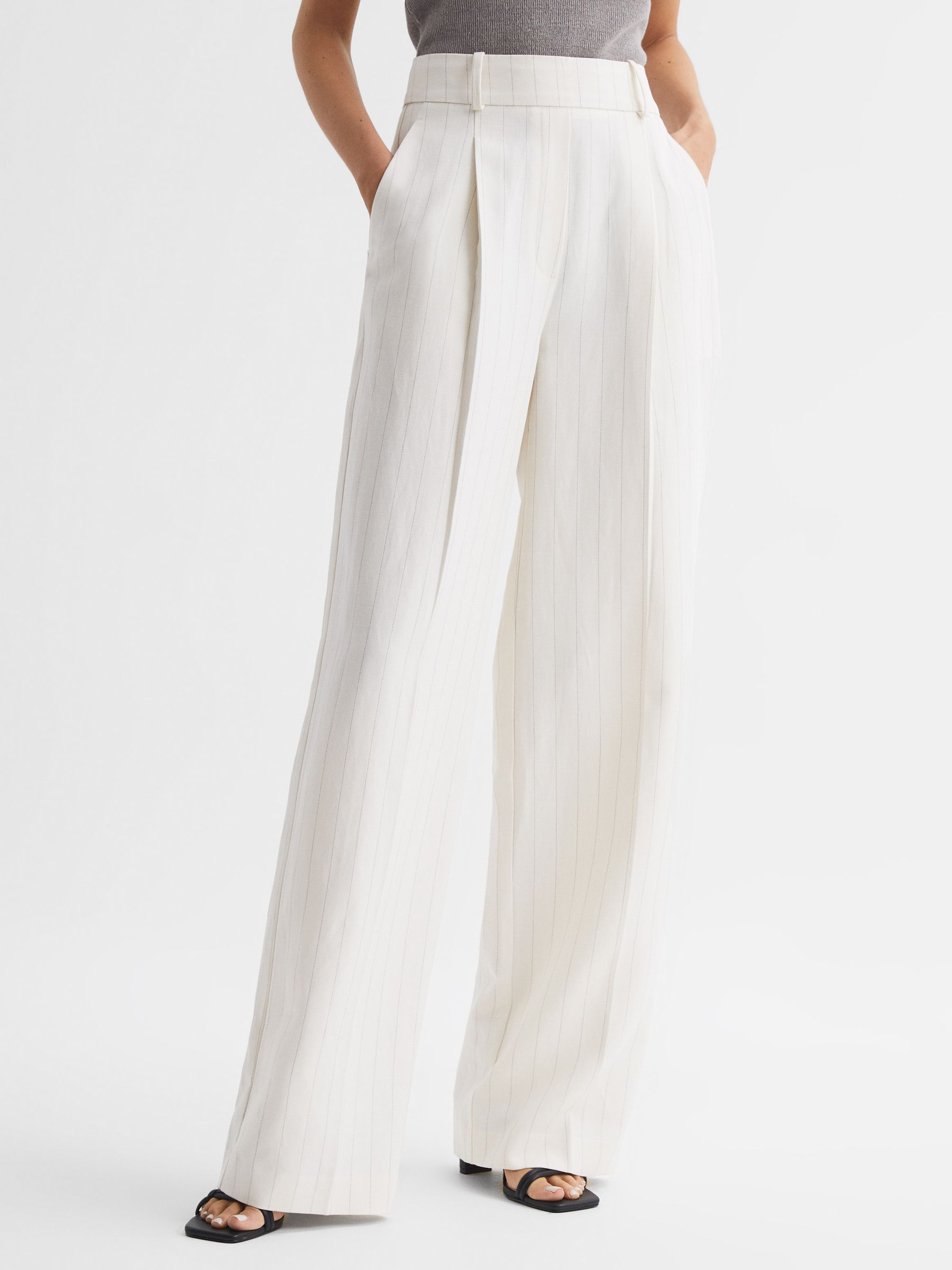 Wide Leg High Rise Pinstripe Trousers in White - REISS