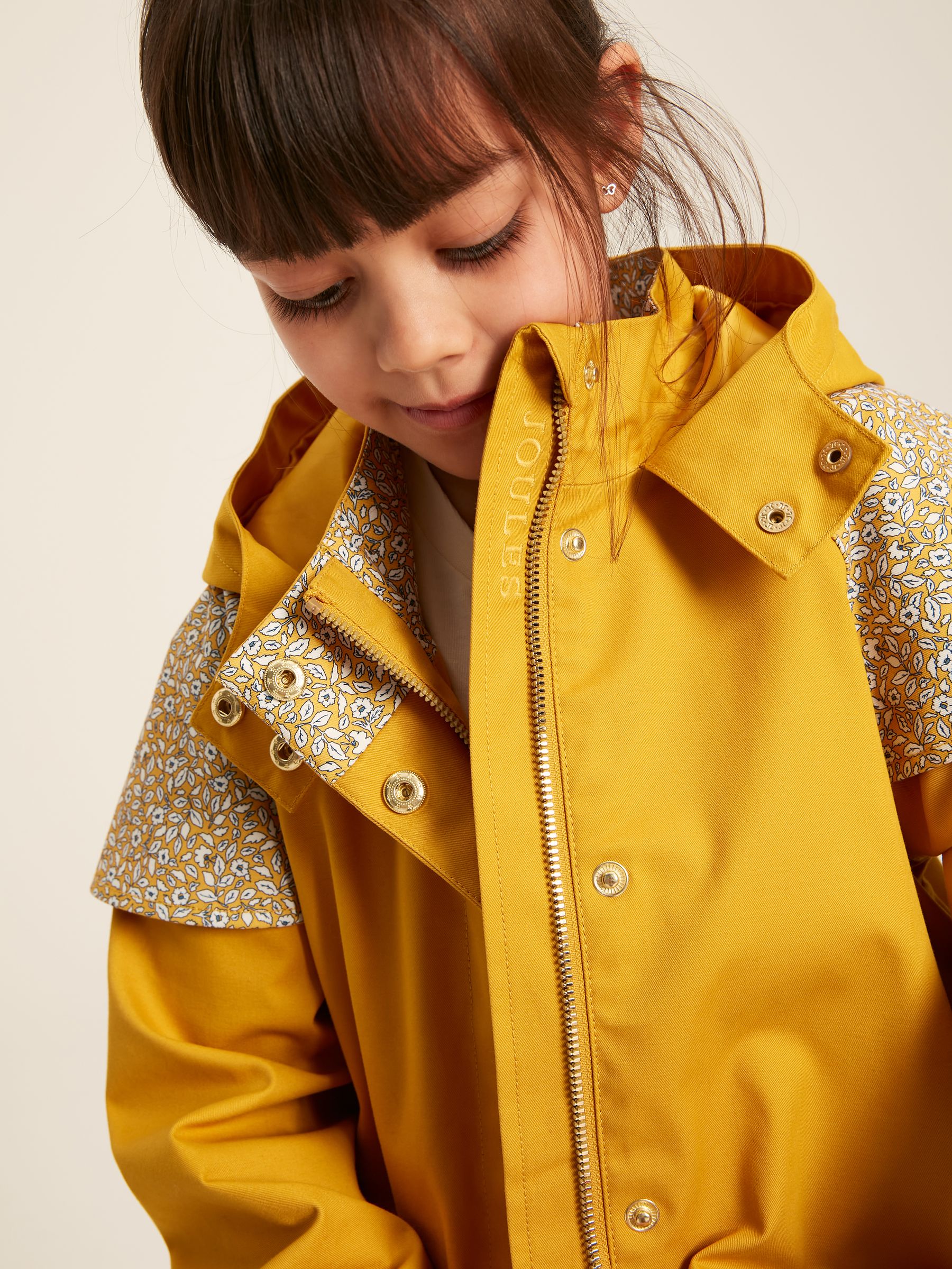 Yellow polka dot raincoat on sale