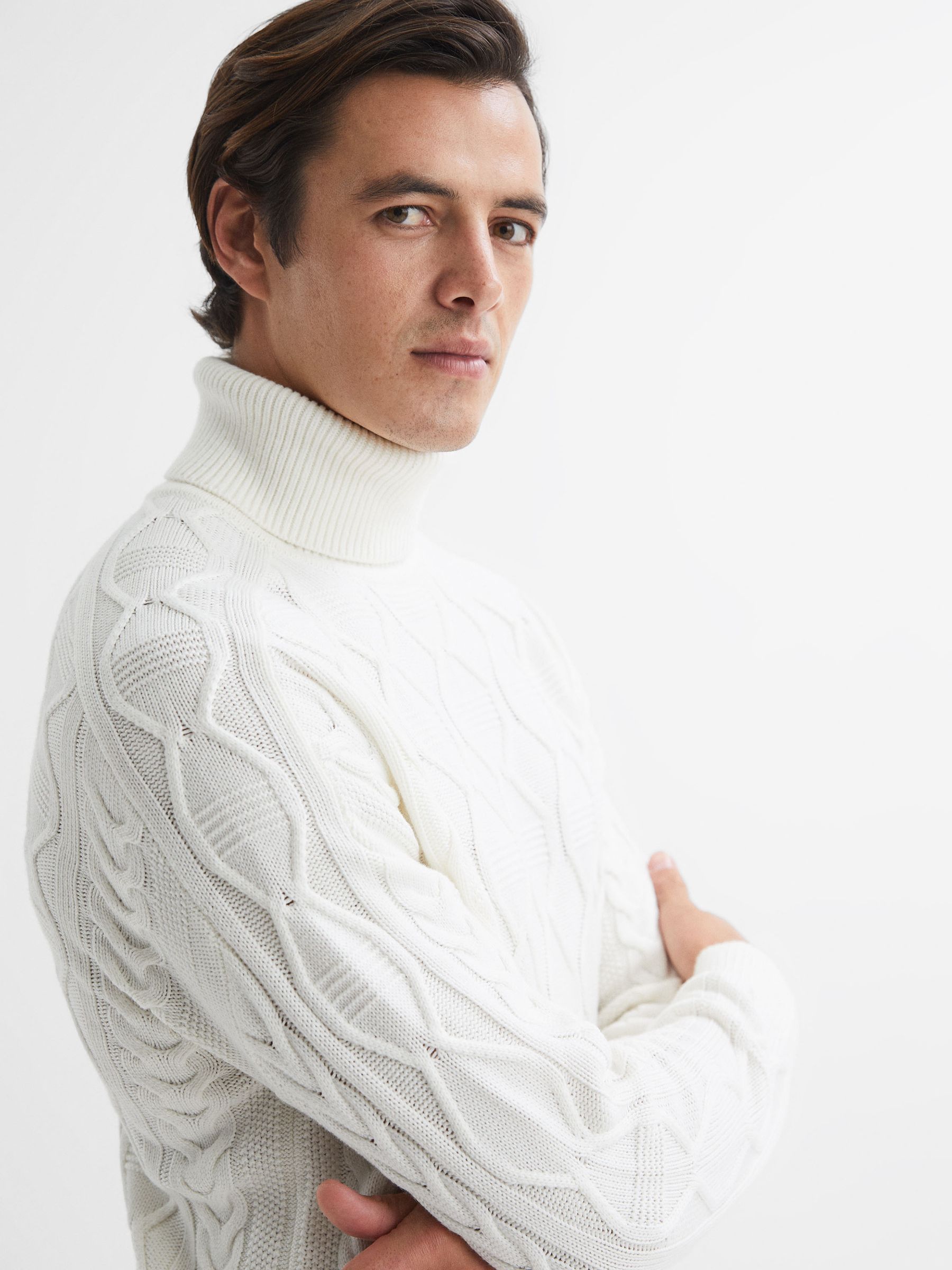 White cable knit roll neck jumper top