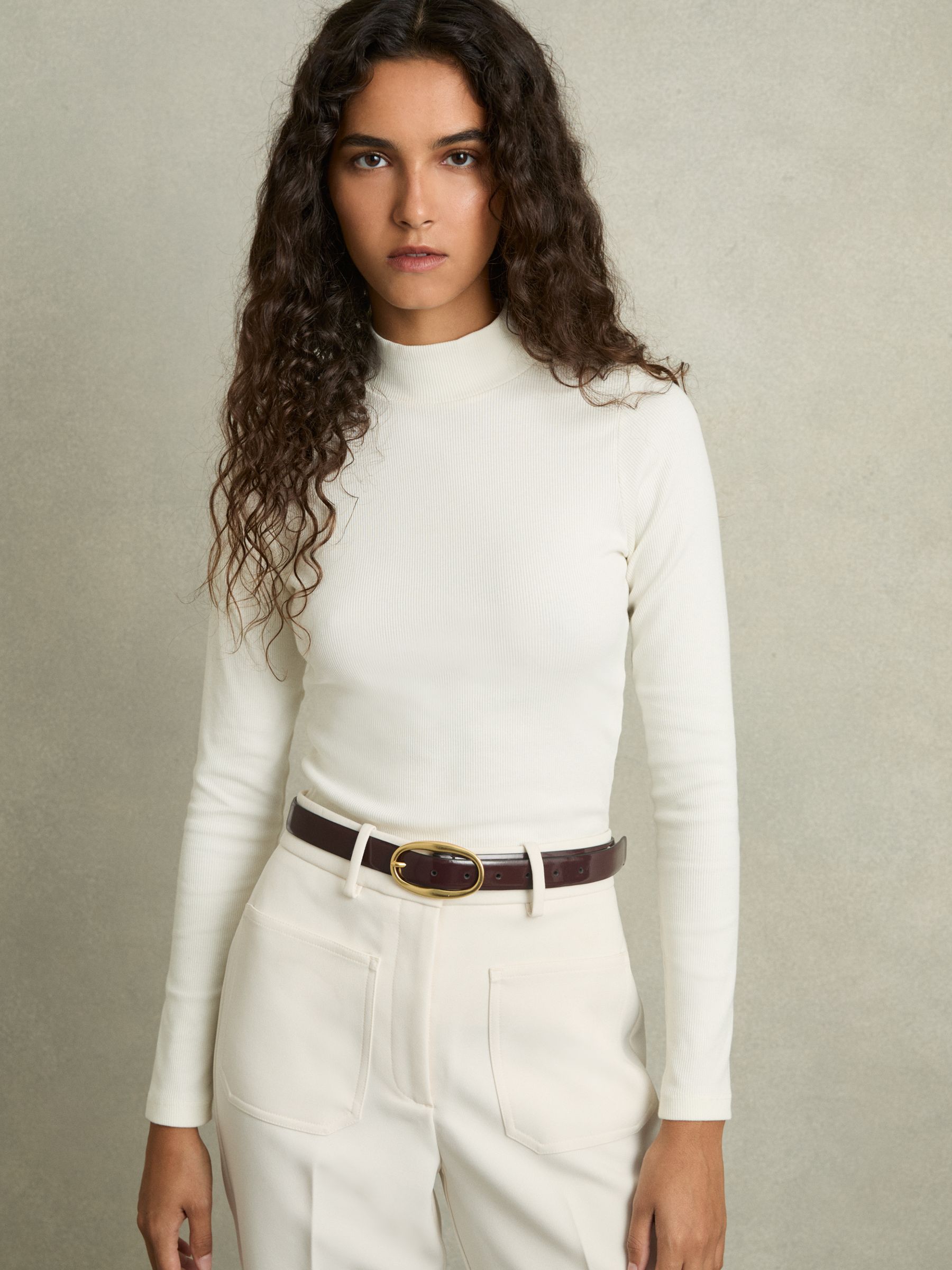 White ribbed roll neck top on sale