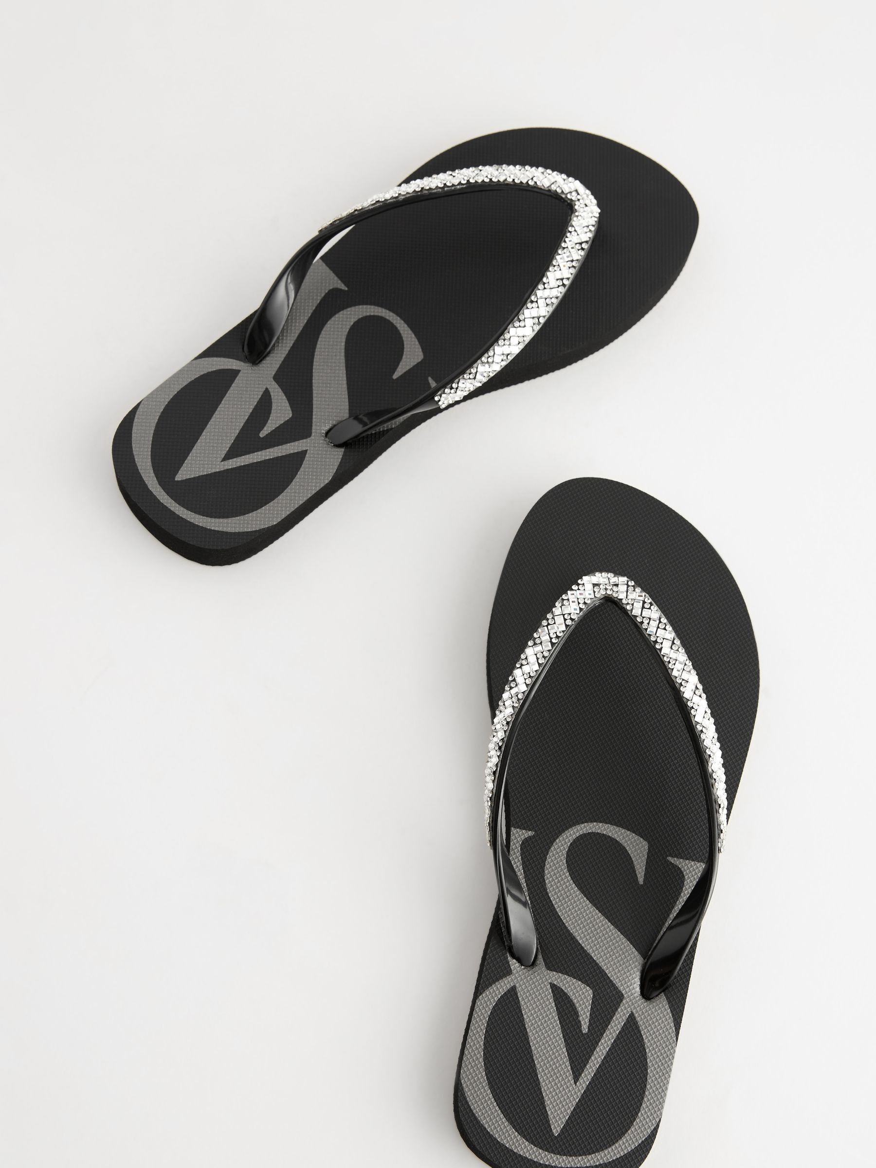 Buy Victoria s Secret Black Diamante Logo Flip Flops from the Victoria s Secret UK online shop