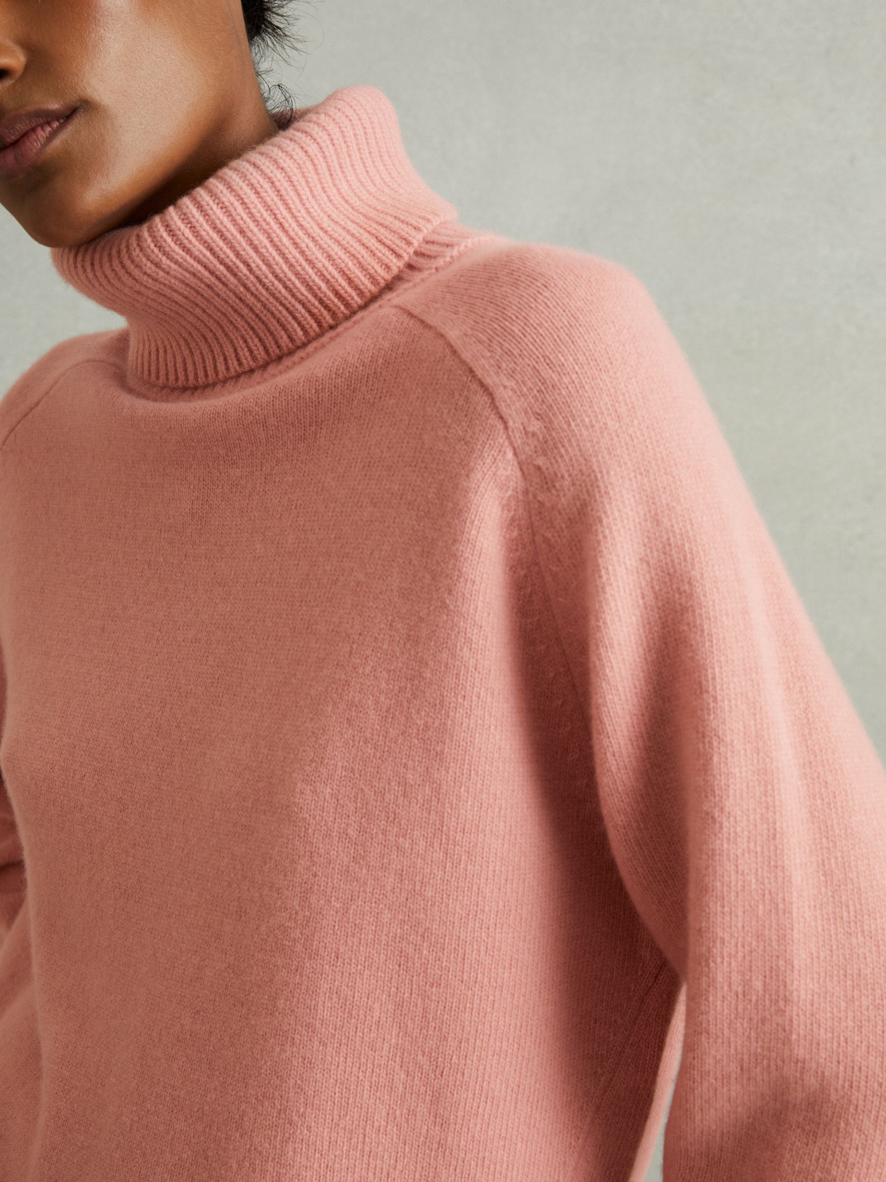 Soft roll neck jumper hot sale