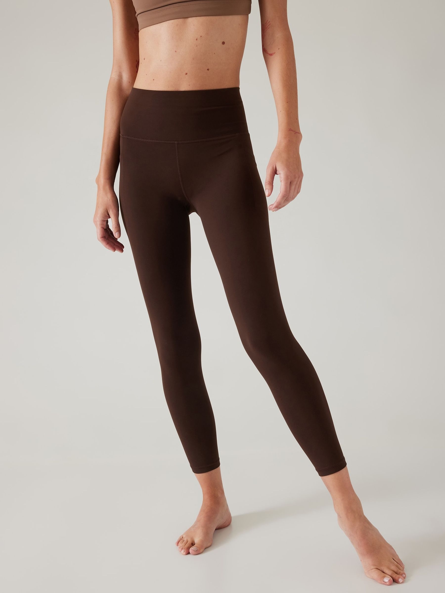 Athleta Brown Salutation Stash 7 8 Leggings