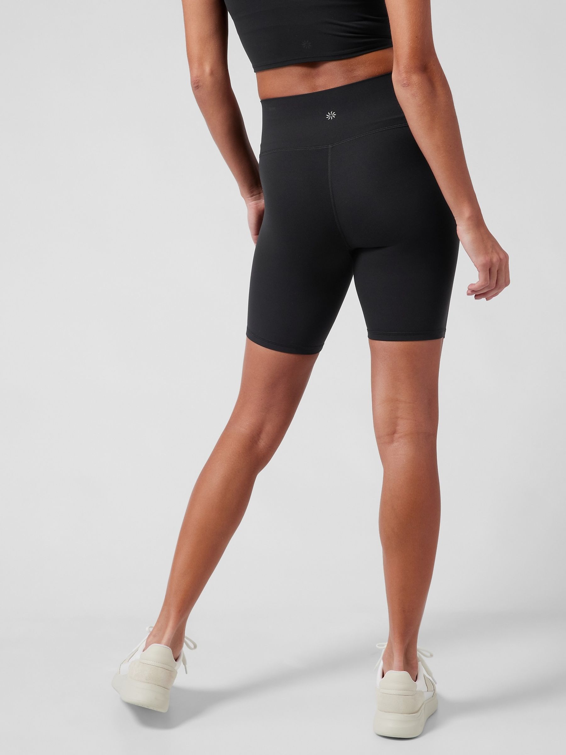 Buy Athleta Black Transcend Mid Rise 5 Cycling Shorts from the Gap online shop