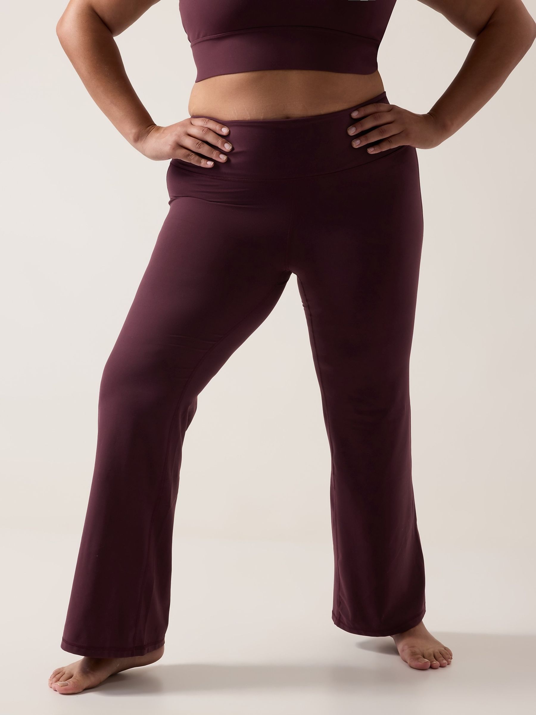 Buy Athleta Burgundy Red Flare Elation Ultra High Waisted Leggings from the Gap online shop