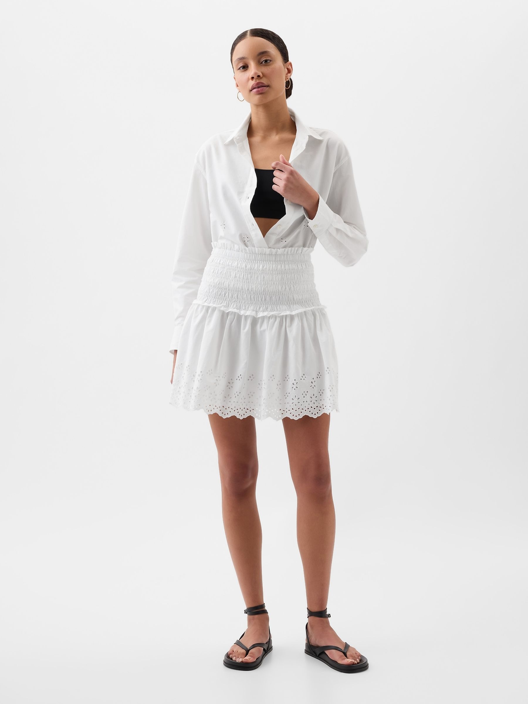 Buy White Smocked Eyelet Mini Skirt from the Gap online shop