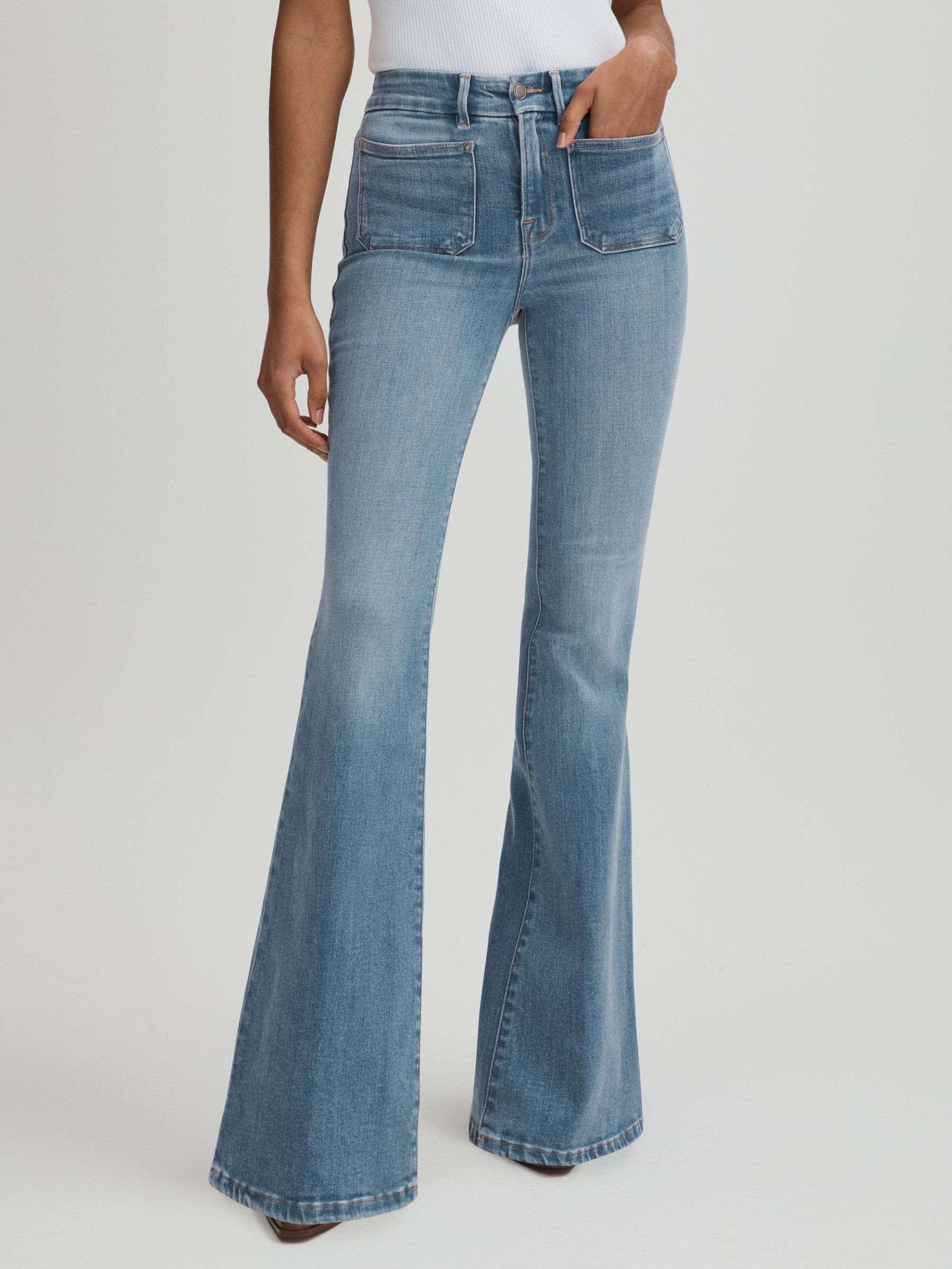 Mid Blue Good American Mid Rise Flared Jeans