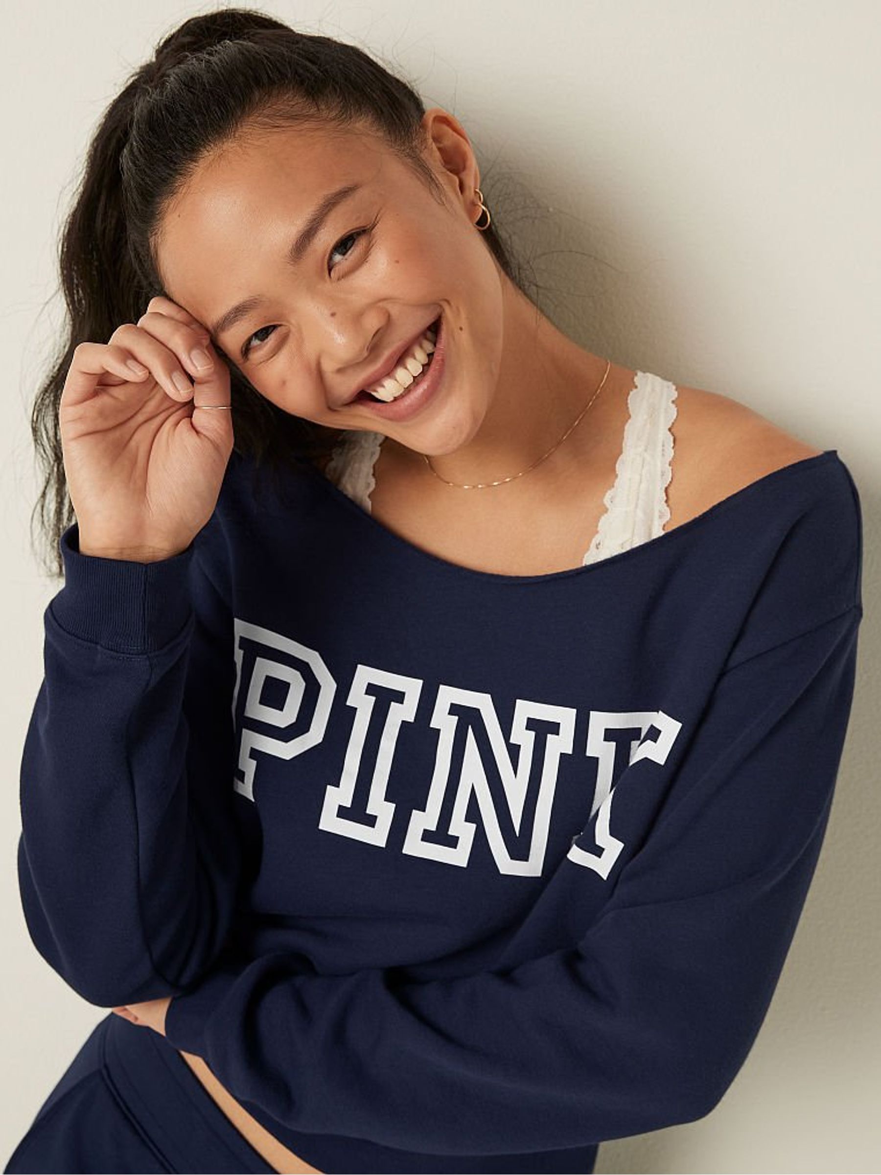 Off the shoulder graphic sweatshirt deals