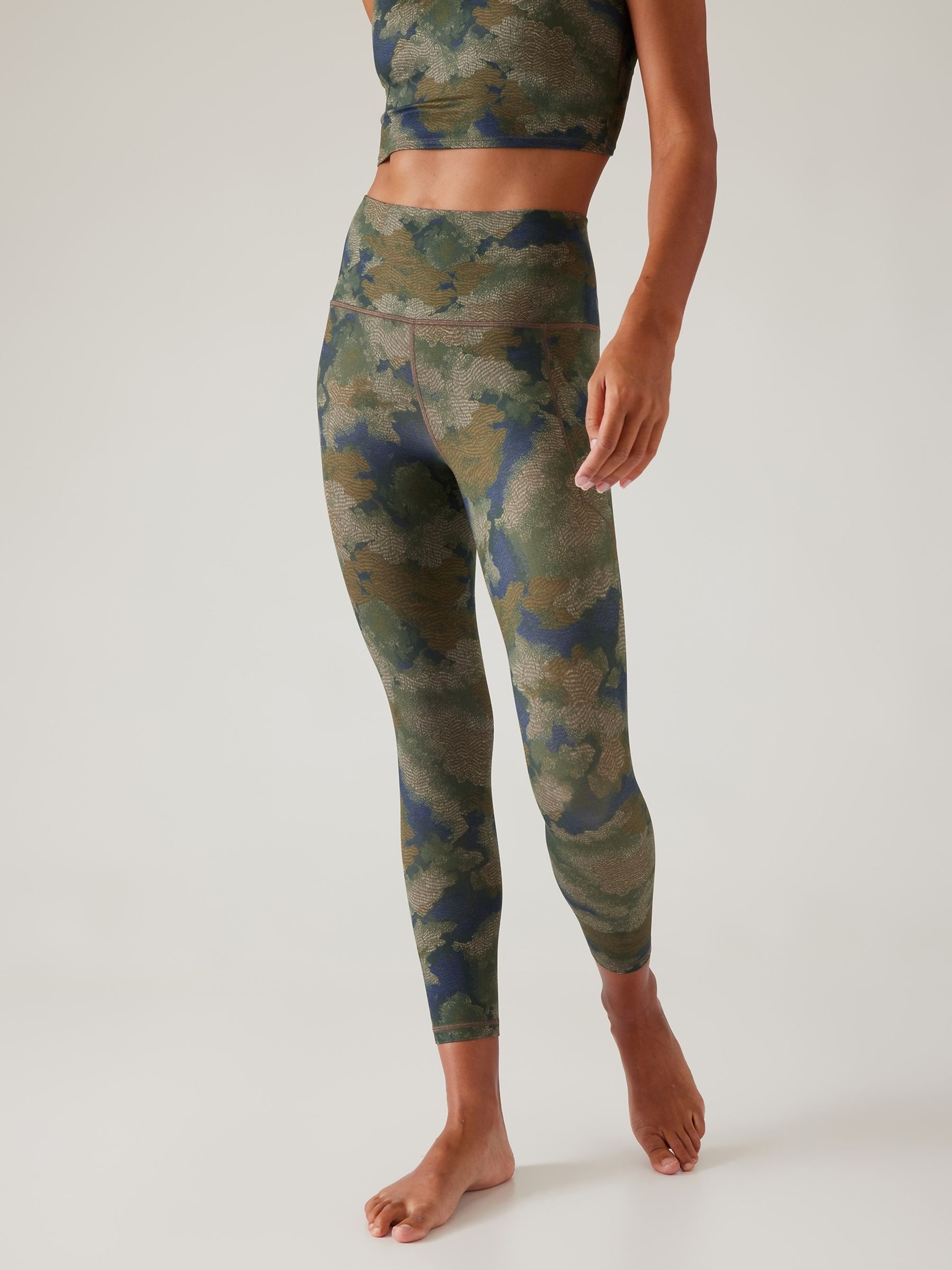 Buy Athleta Green Salutation Stash 7 8 Leggings from the Gap online shop