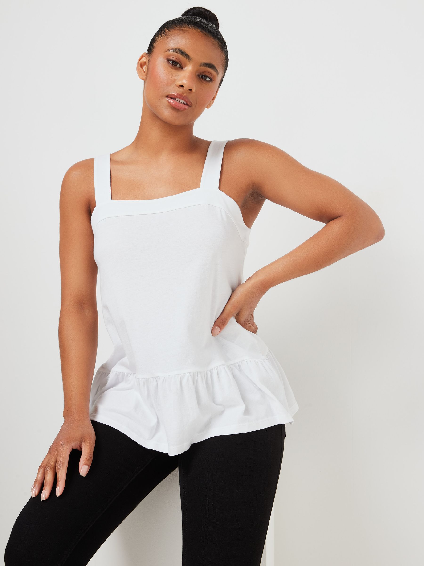 Buy White Sleeveless Peplum Top from the Gap online shop