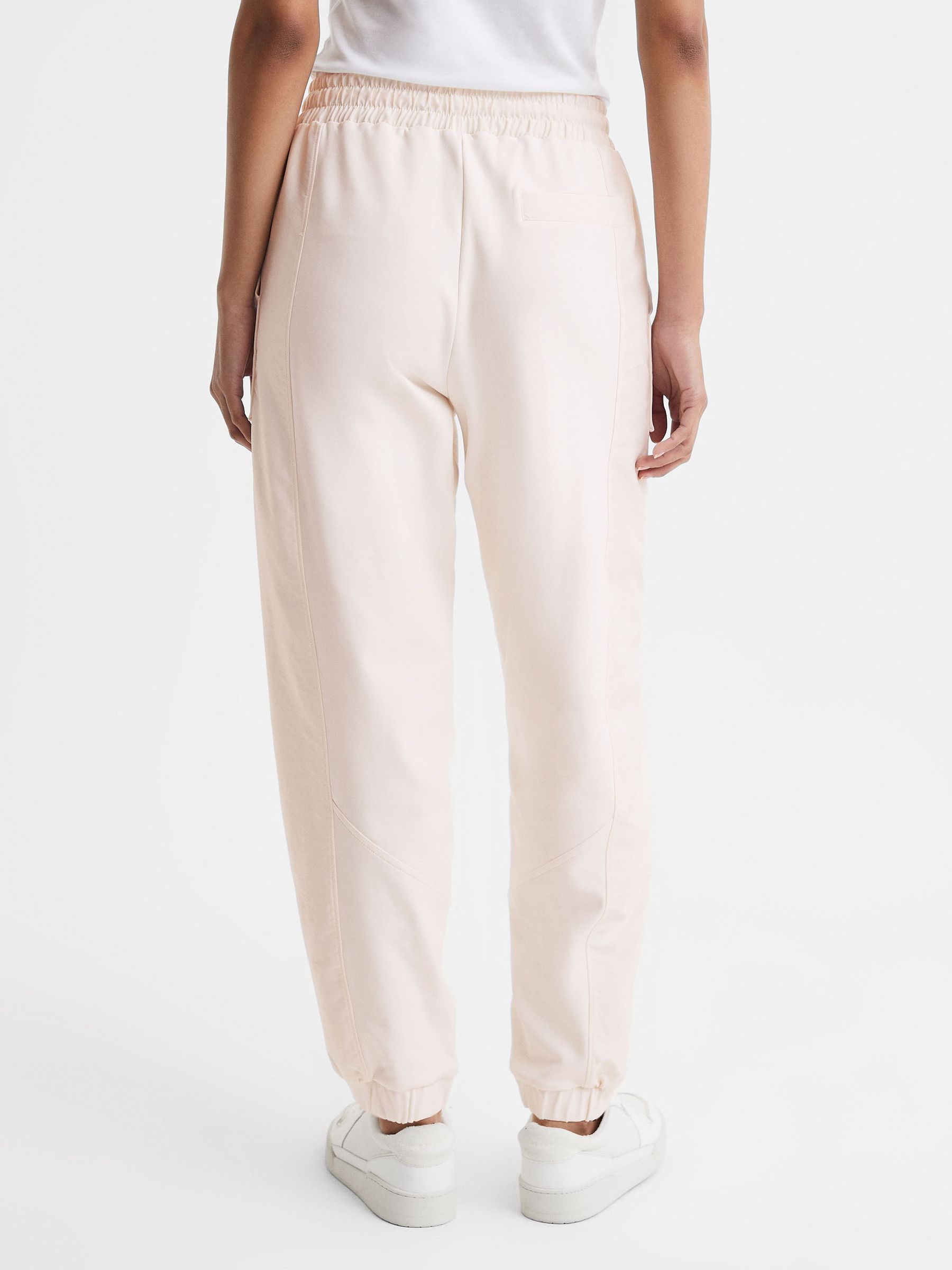 Cream tracksuit bottoms sales
