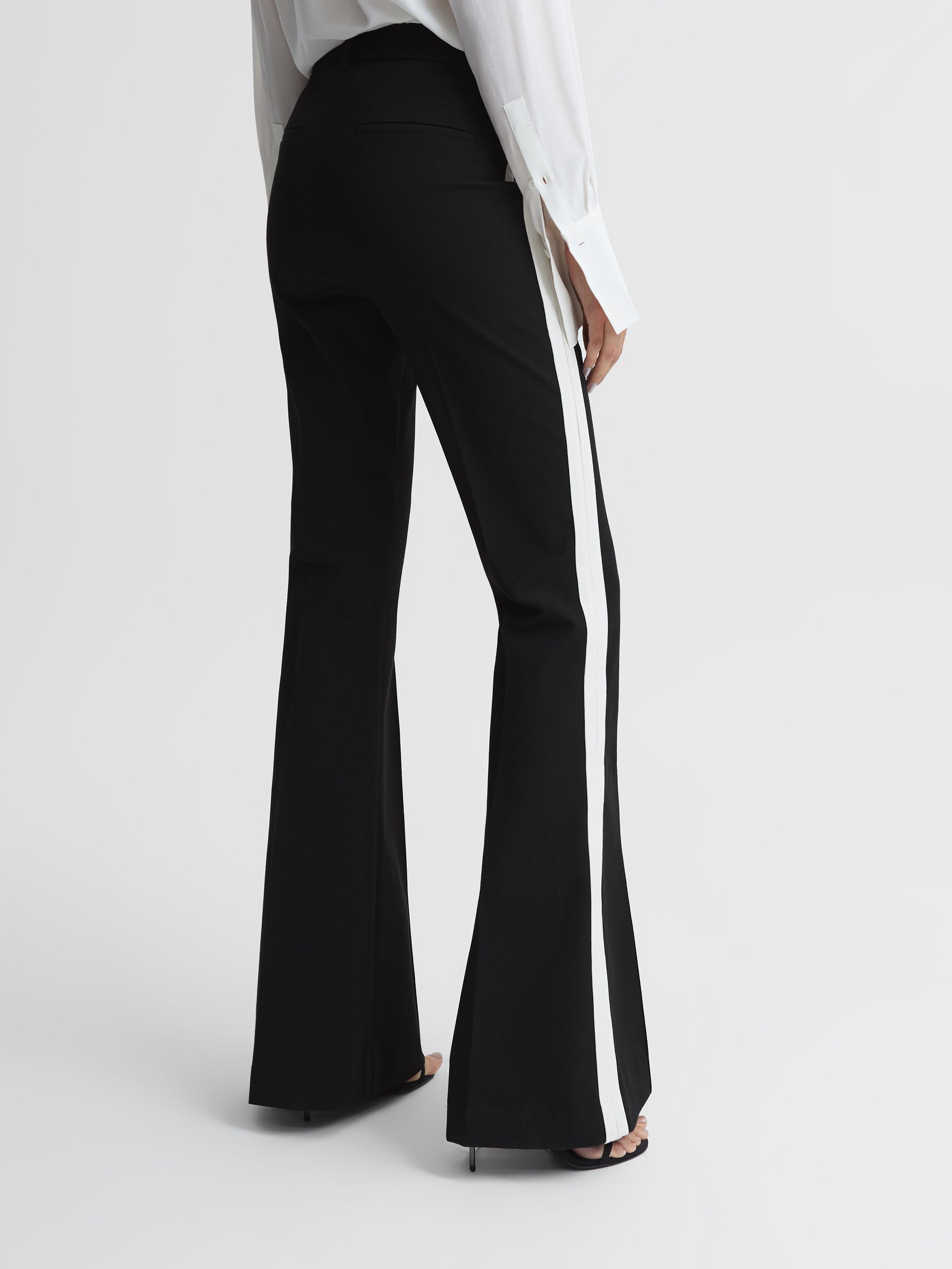 Reiss Petite Flared Side Stripe Trousers in Black REISS