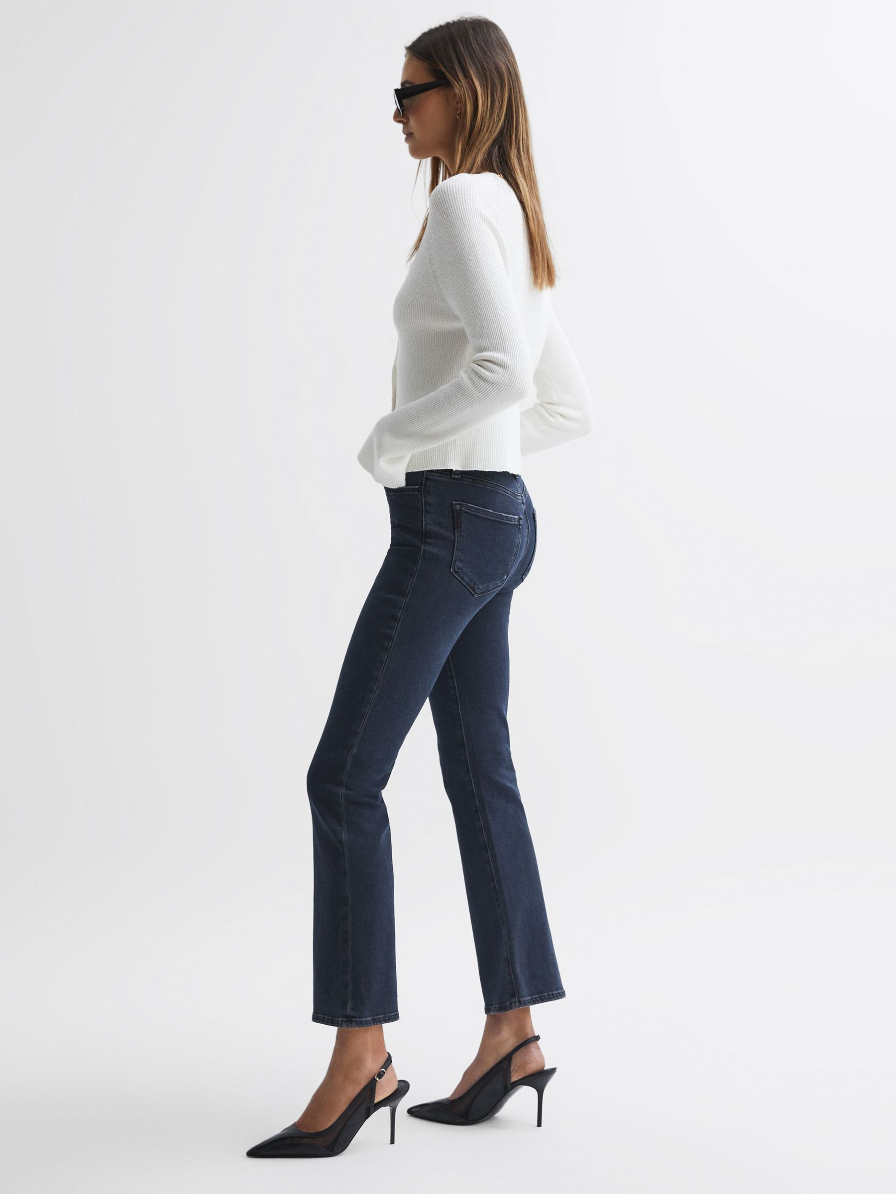 Paige High Rise Flared Jeans in Aster (184784) | £130