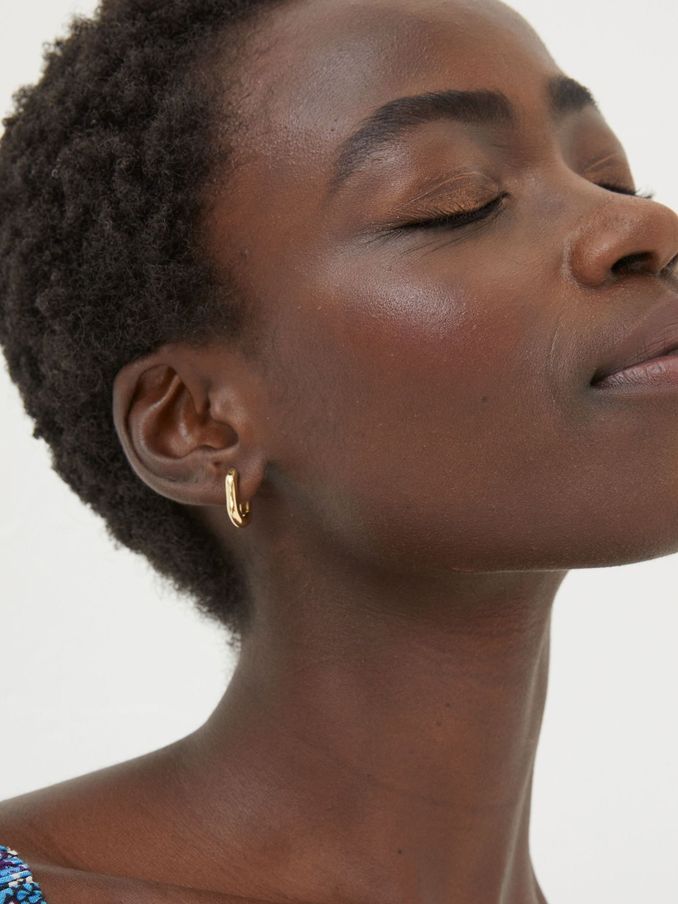 Gold Tone Oval Huggy Hoop Earrings (E55928) | £10.50