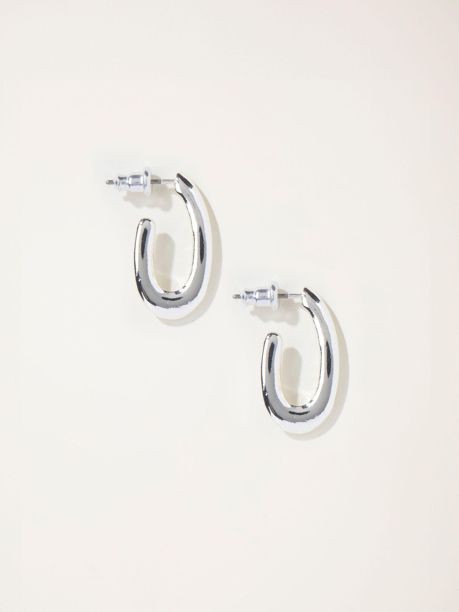Silver Tone Twist Oval Hoop Earrings (F19066) | £12.50