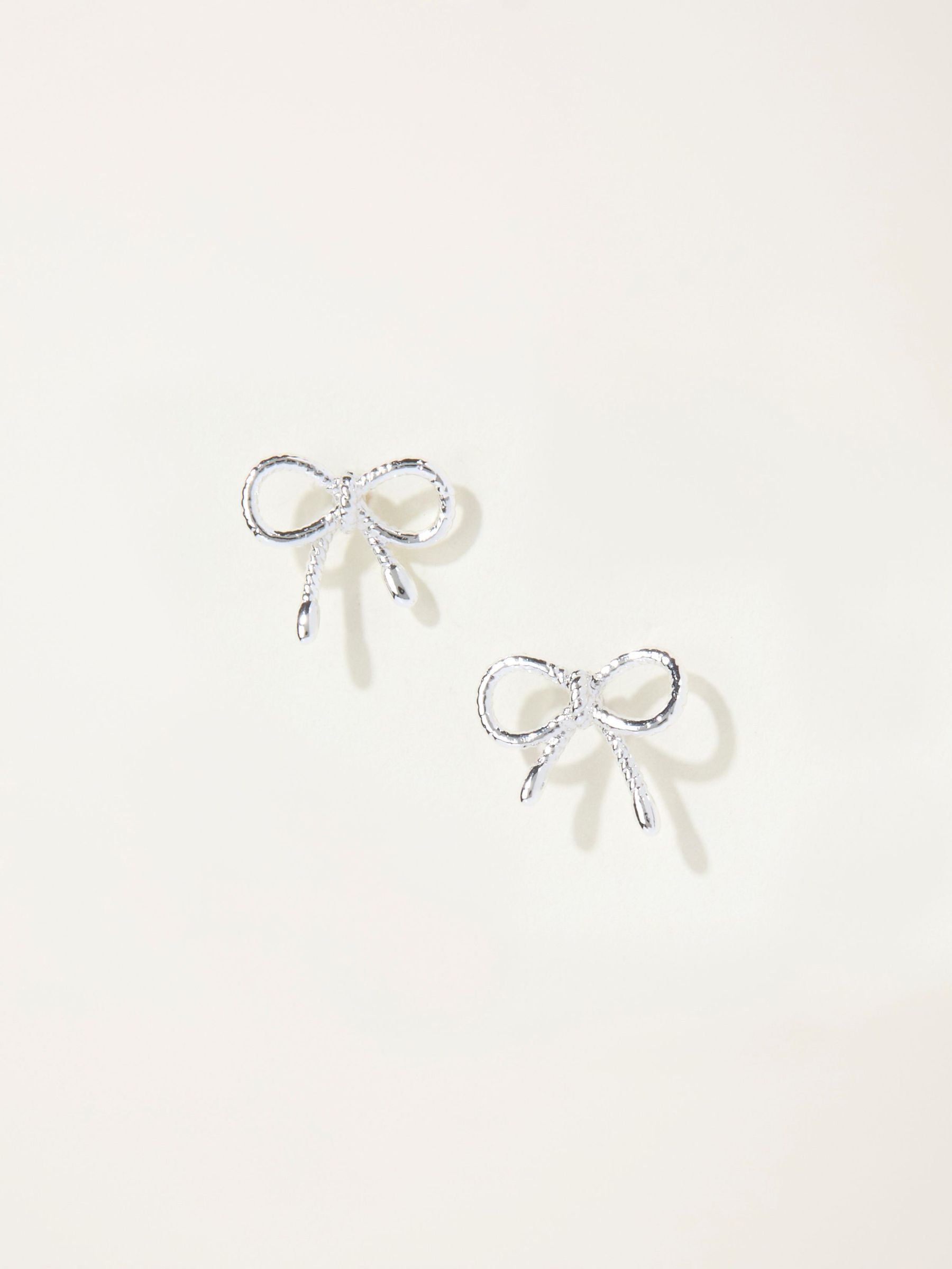 Silver Tone Bow Stud Earrings (F19079) | £8.50