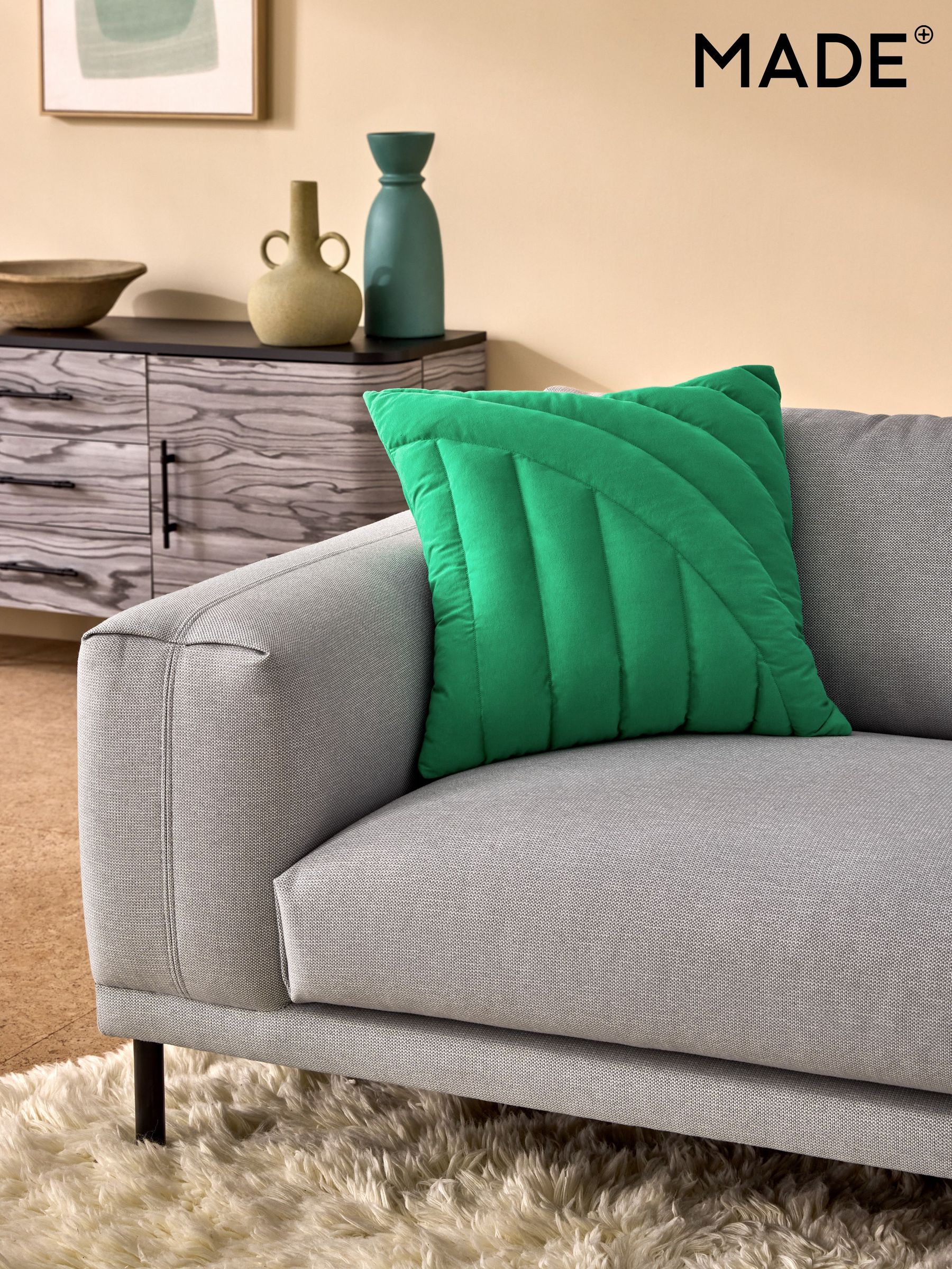 Lonny Quilted Jersey Cushion in Green (F22923) | £22