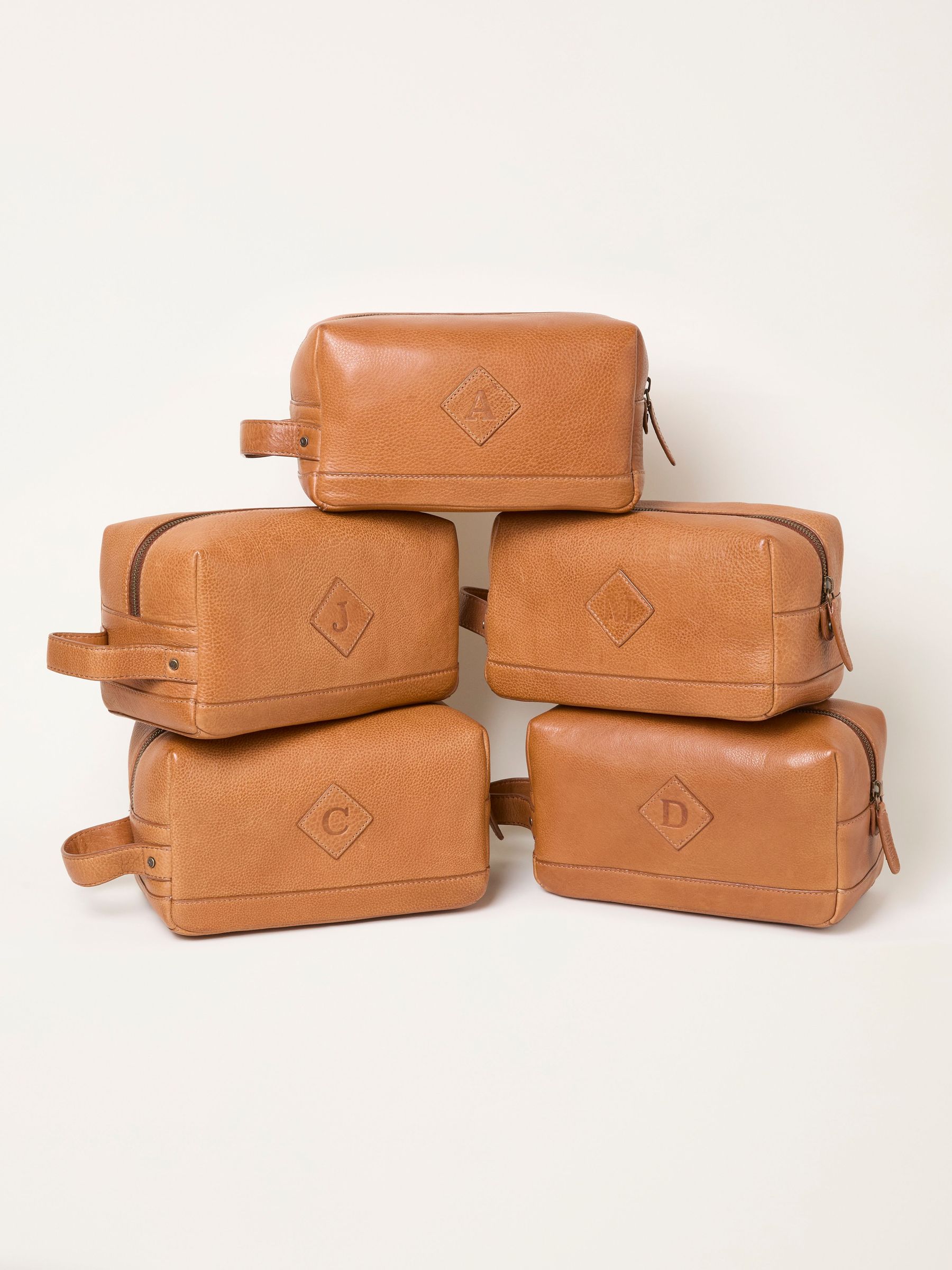 Tan Brown Alphabet Leather Wash Bag (F78763) | £35