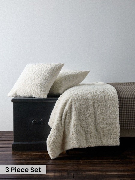 The Set 3 Piece Textured Faux Fur Throw And Cushion Covers
