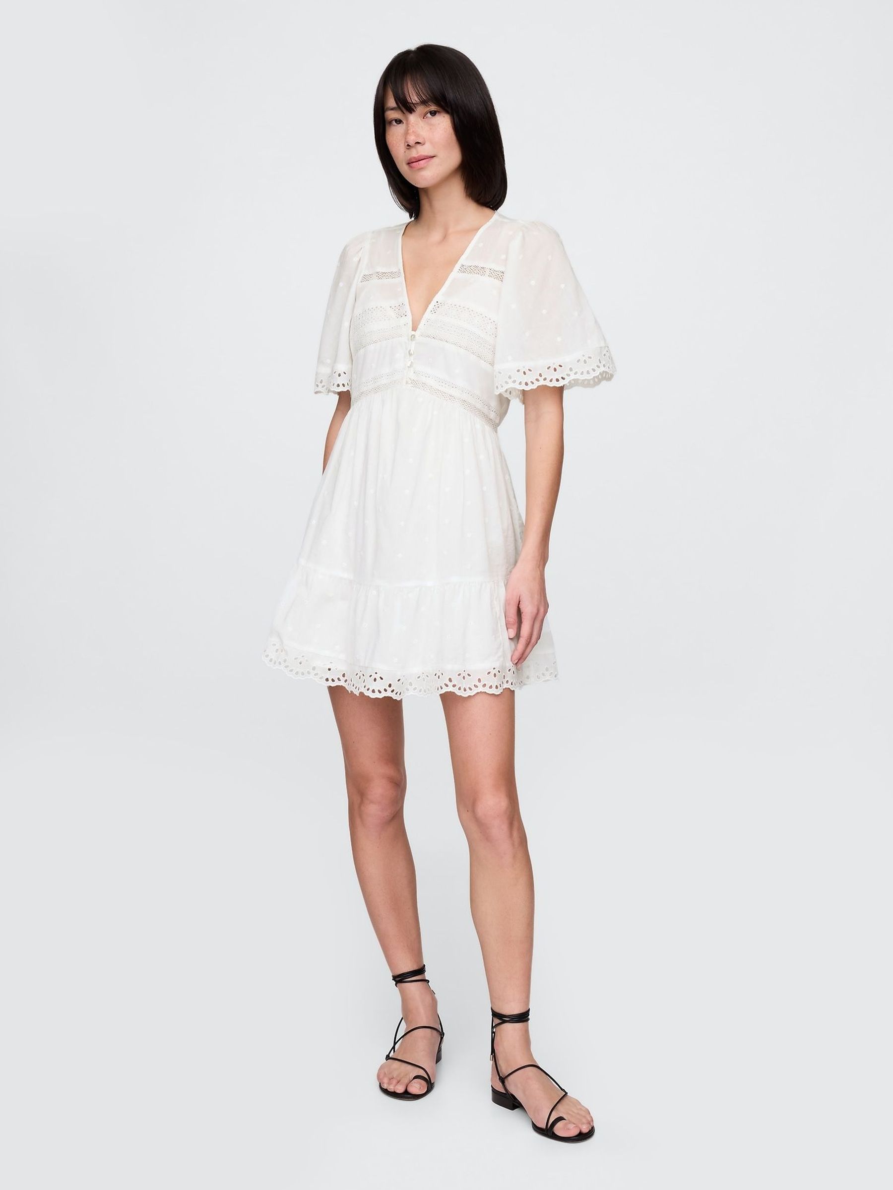 White Flutter-Sleeve Eyelet Mini Dress (H11941) | £95