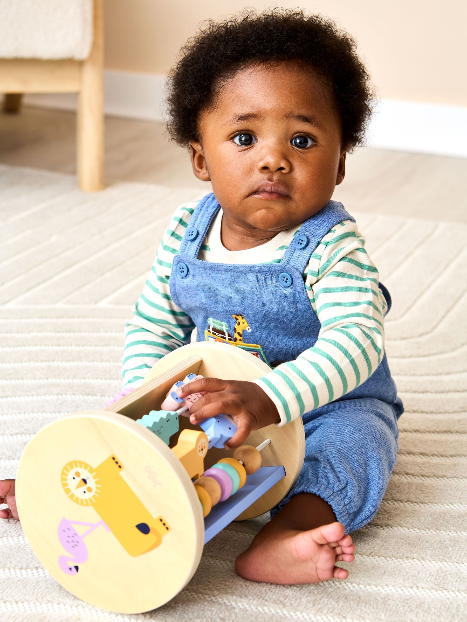 Safari Wooden Activity Roller (H51422) | £26