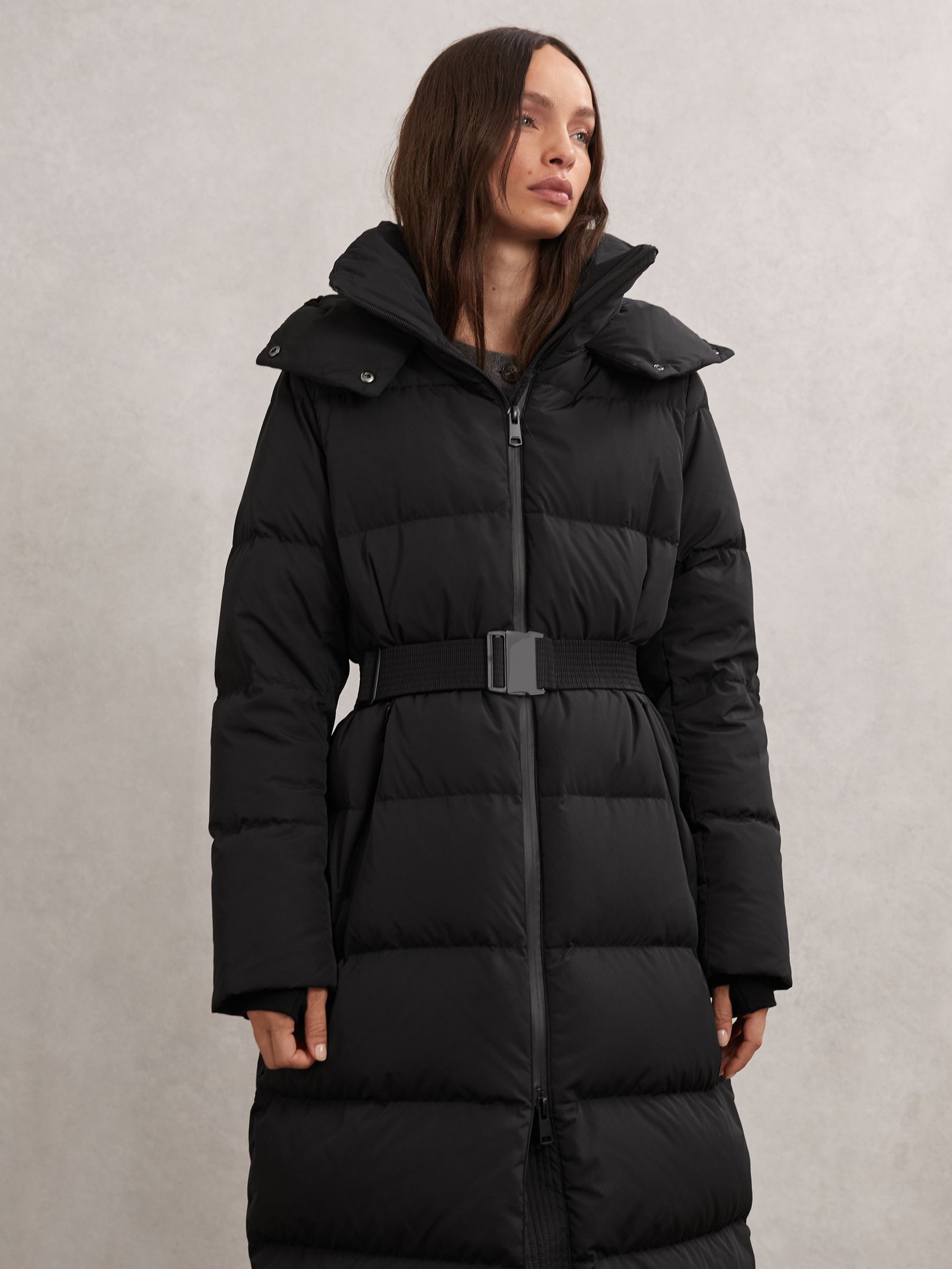 Petite Belted Longline Hooded Puffer Coat in Black (H64316) | £398