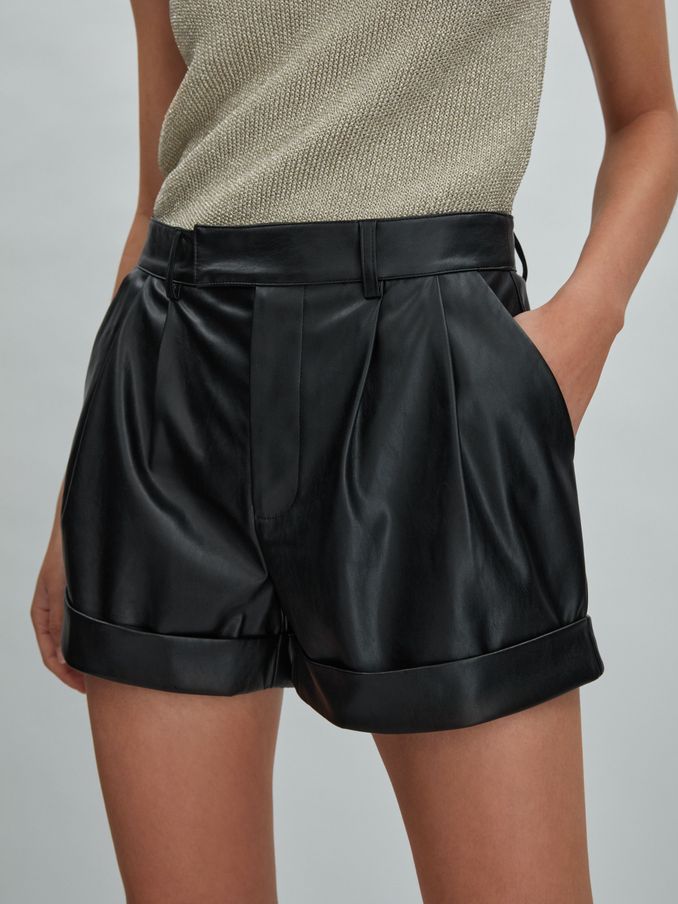 Paige Front Pleat Faux Fur Leather Shorts in Black (N74310) | £110