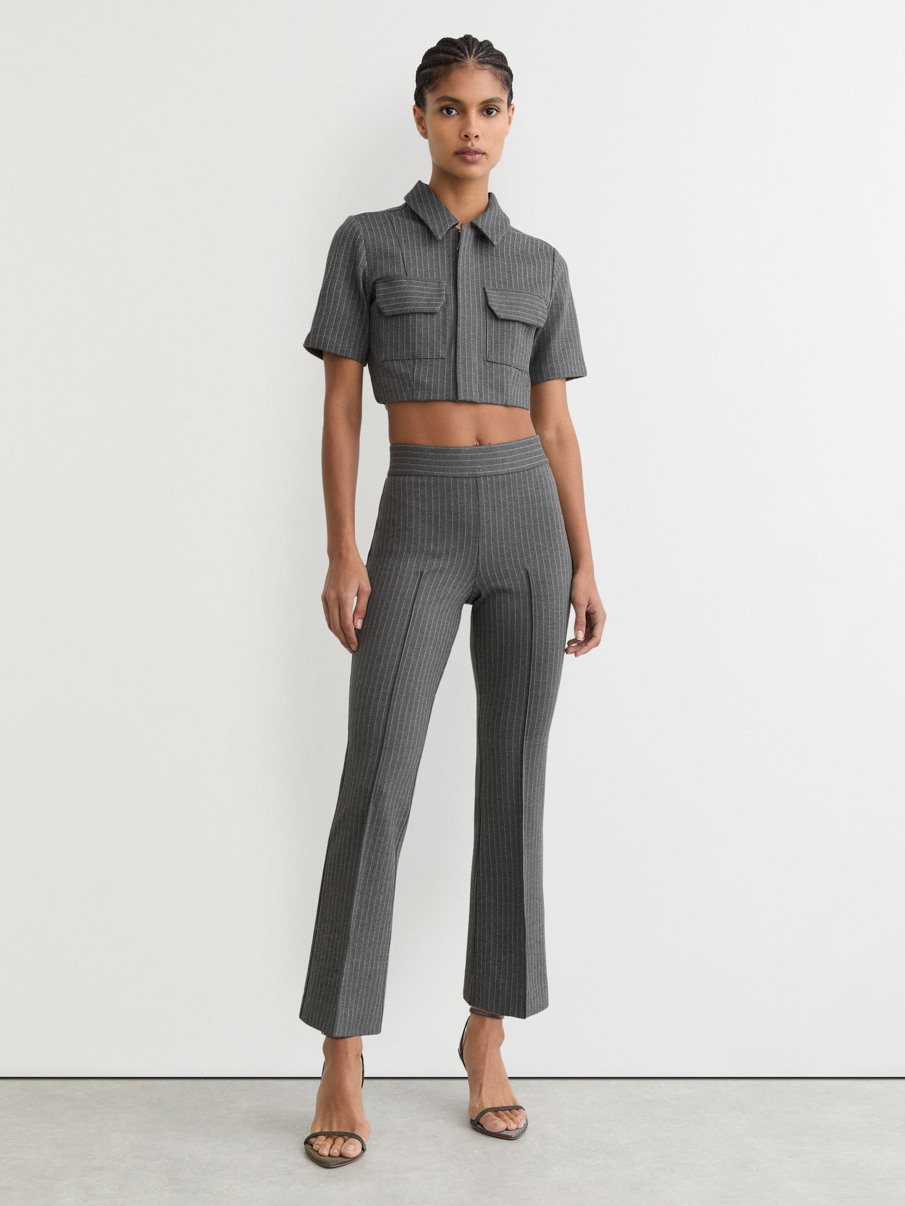 Good American Kick-Flare Trousers in Charcoal Grey (W67660) | £158