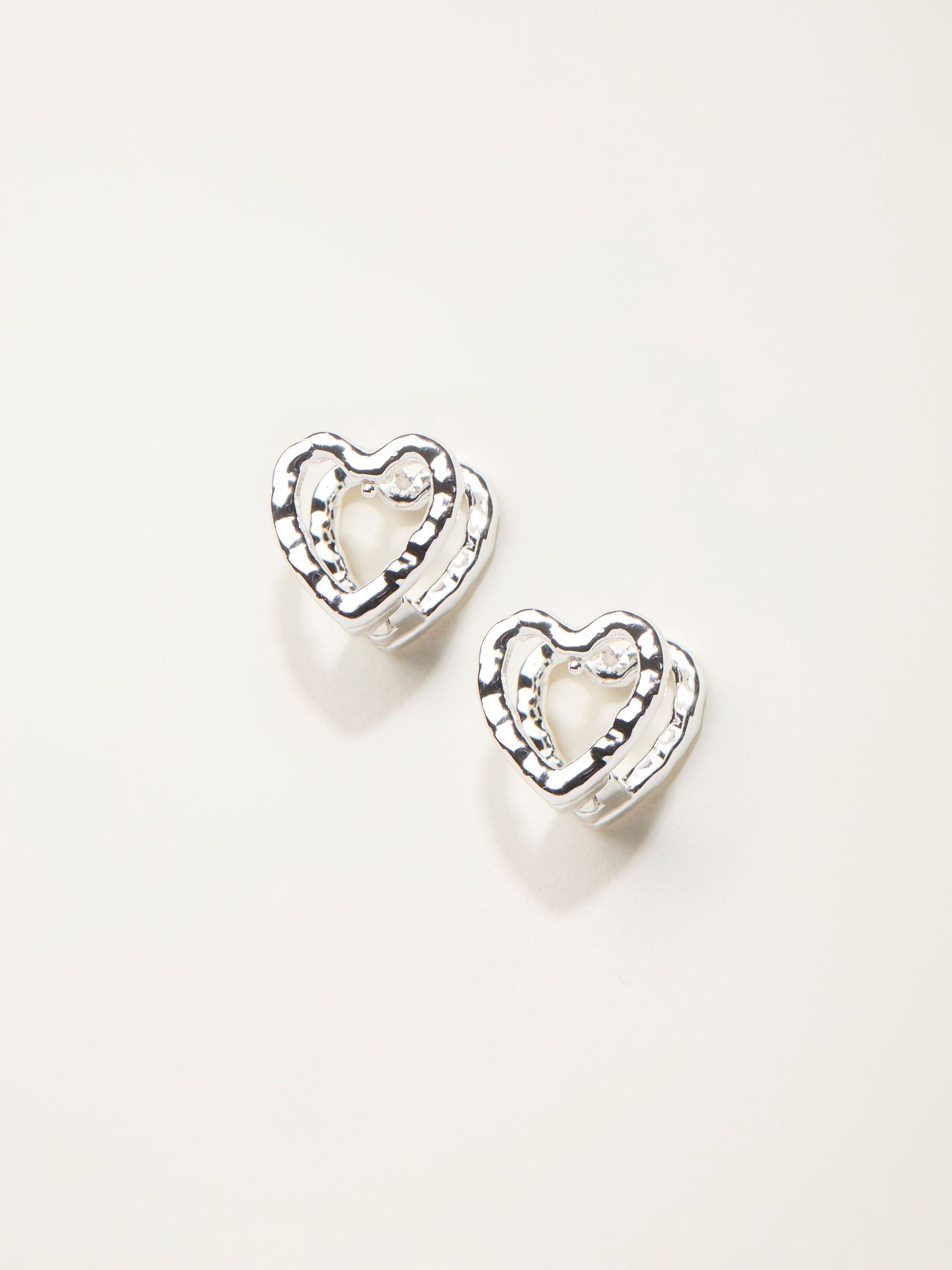 Silver Tone Heart Huggie Earrings (W75110) | £10.50