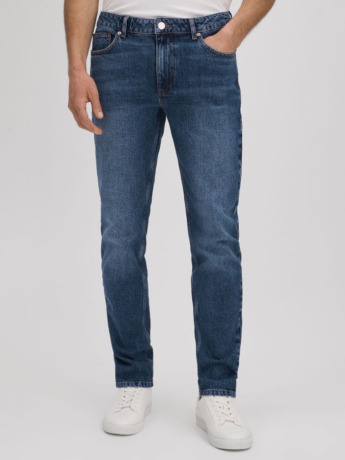 Tapered Slim Fit Washed Jeans in Mid Blue Wash (126198) | $158